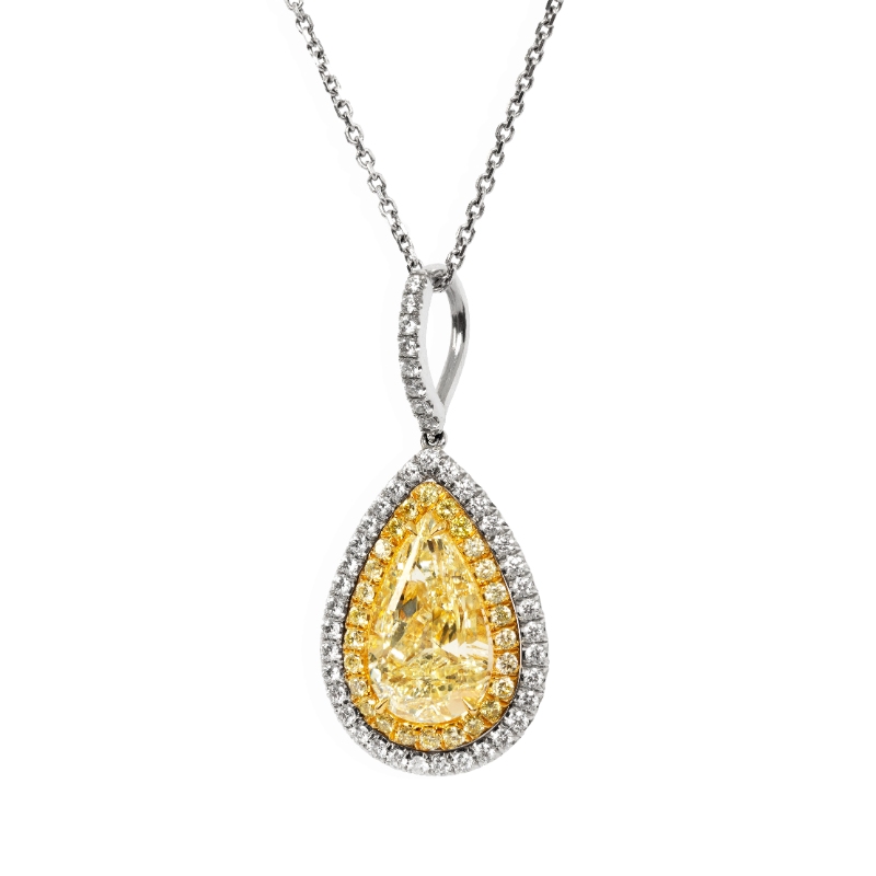 18k White Gold Yellow and White Diamond Necklace .79ctw pear shape. yellow diamond .11ctw F color white diamond