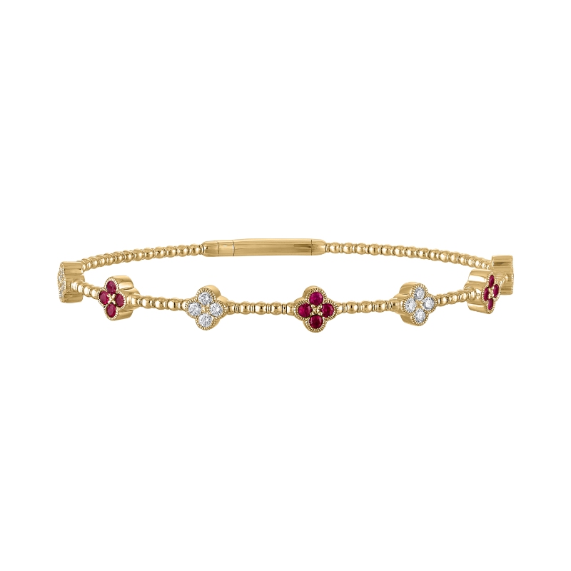 The Battery Park Garnet and Diamond Flower Bracelet in 14K Yellow Gold. 