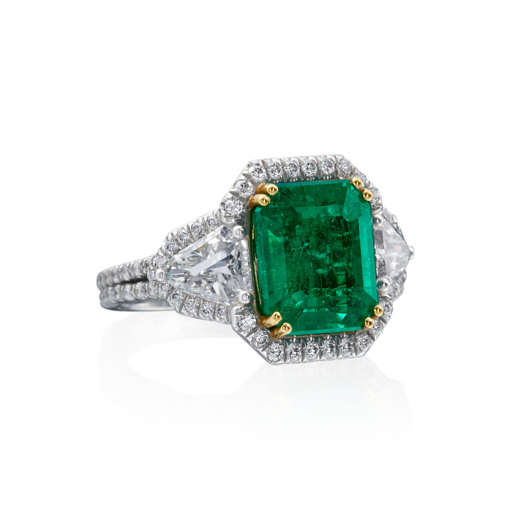 Platinum and Emerald Three Stone Ring