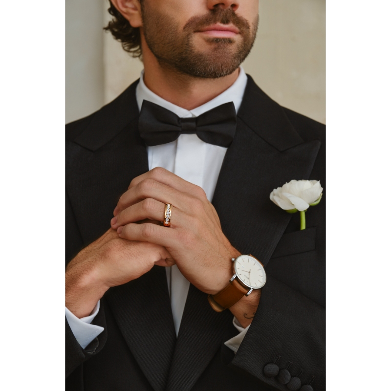 The Diamond Jim Channel-Set Men's Wedding Band in 14K White Gold (1K Round Cut).