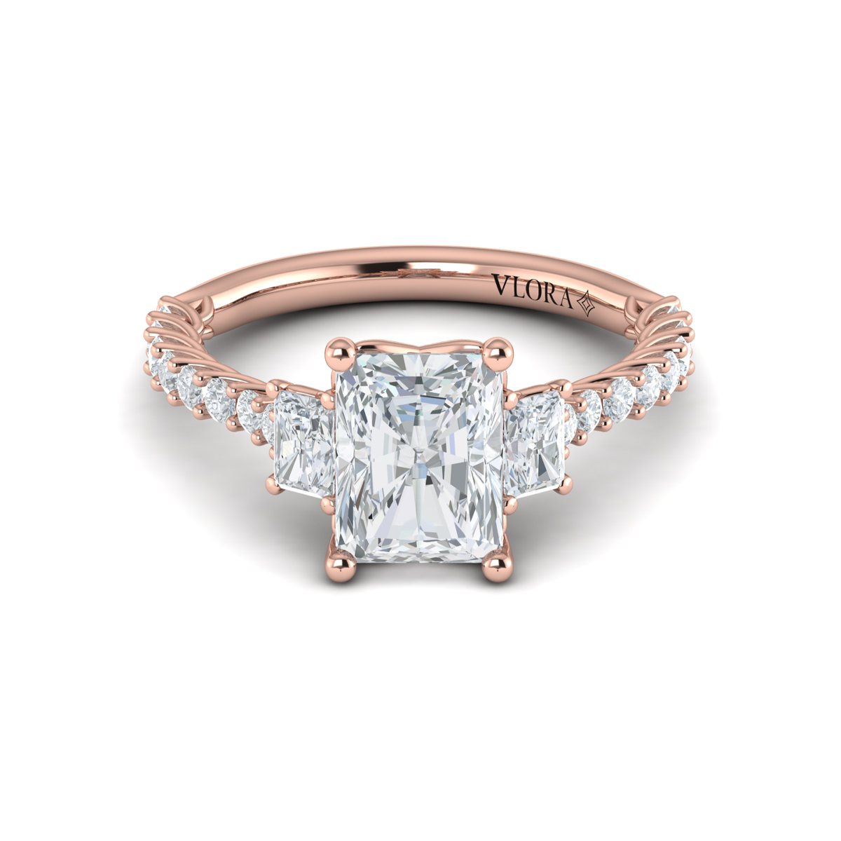 Interwoven Emerald Cut Three Stone Engagement Ring